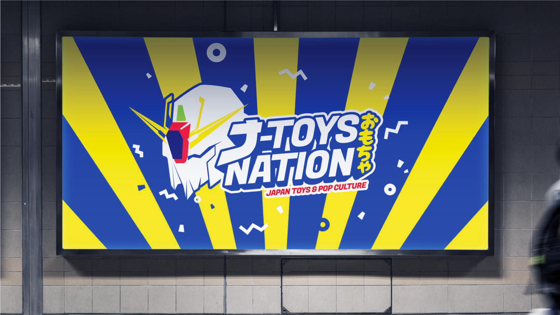 Mockup pengaplikasian branding j toys nation pada bilboard